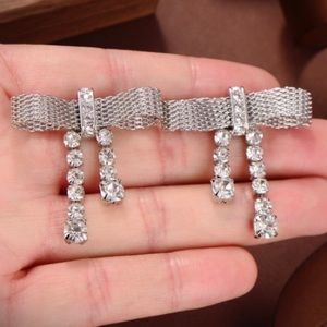 Miu Miu Bow Tie Earrings